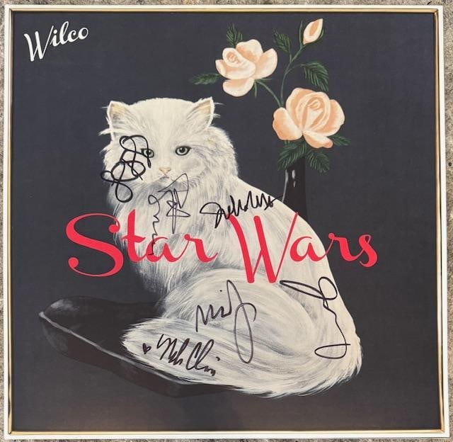Wilco Fully Group Signed "Star Wars" LP Album (6 Sigs) (Third Party Guaranteed): "Star Wars" LP album signed on the cover in black felt tip marker by Wilco band members Jeff Tweedy, John Stirratt, Nels Cline, Pat Sansone, Mikael Jorgensen, and Glenn Kotche. Measuring approximately