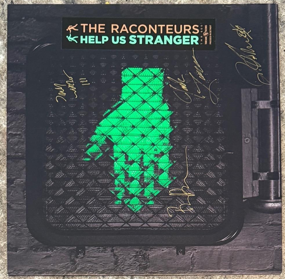 The Raconteurs Fully Group Signed "Help Us Stranger" LP Album (4 Sigs): "Help Us Stranger" LP album signed on the cover in gold felt tip marker by The Raconteurs band members Jack White, Brendan Benson, Jack Lawrence, and Patrick Keller. Measuring approximately 12" x 12"