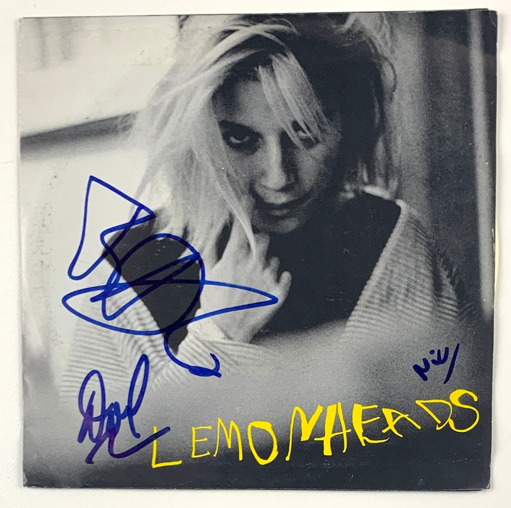The Lemonheads Group Signed "Luka, Strange, Mad" 45 (JSA Authentication): "Luka, Strange, Mad" 45 signed on the cover in blue felt tip marker by The Lemonheads band members Evan Dando, Ben Deily, and Jesse Peretz. Measuring approximately 7" x 7" and in fine condition.