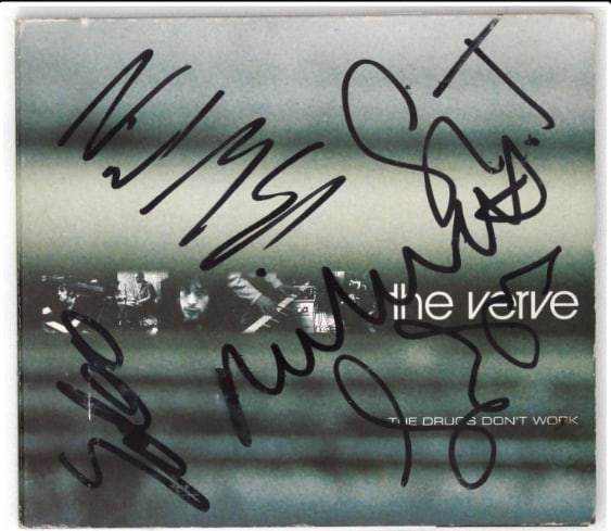 The Verve Fully Group Signed “The Drugs Don't Work” CD (4 Sigs) (JSA Authentication): "The Drugs Don't Work” CD signed on the cover in black felt tip marker by The Verve band members Richard Ashcroft, Nick McCabe, Simon Jones, and Peter Salisbury. Measuring approximately