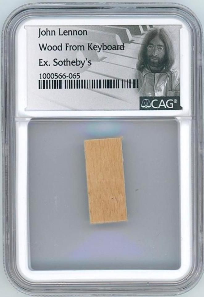John Lennon Wood Fragment from Personally Owned Keyboard (CAG Encapsulated): Wood fragment, 0.5" x 1" taken from a late 19th-century Mason & Hamlin pump organ personally owned by John Lennon. The instrument was sold at Sotheby’s on June 23, 1984 as part of the “Col