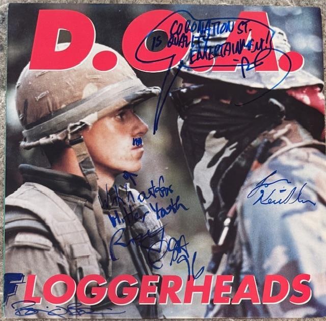 D.O.A. Fully Group Signed "Loggerheads" LP Album (4 Sigs) (Third Party Guaranteed): "Loggerheads" LP album signed on the cover in blue felt tip marker by D.O.A. band members Brien O'Brien, Joe Keithley, Brian 'Roy' Gobble, who inscribed the message from a hand-drawn text bubble sayin