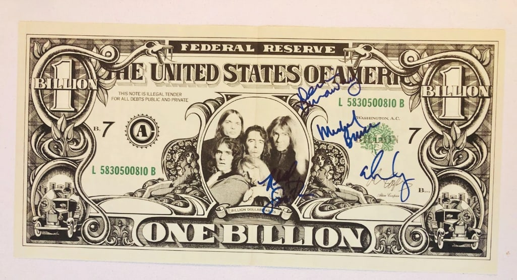Alice Cooper Group Signed "Billion Dollar Babies" 10.75" x 21.75" Dollar Bill (4 Sigs) (JSA): Color 10.75" x 21.75" "Billion Dollar Babies" poster signed in blue felt tip marker by Alice Cooper Band band members Alice Cooper, Neal Smith, Dennis Dunaway, and Michael Bruce. Obtained in-person.