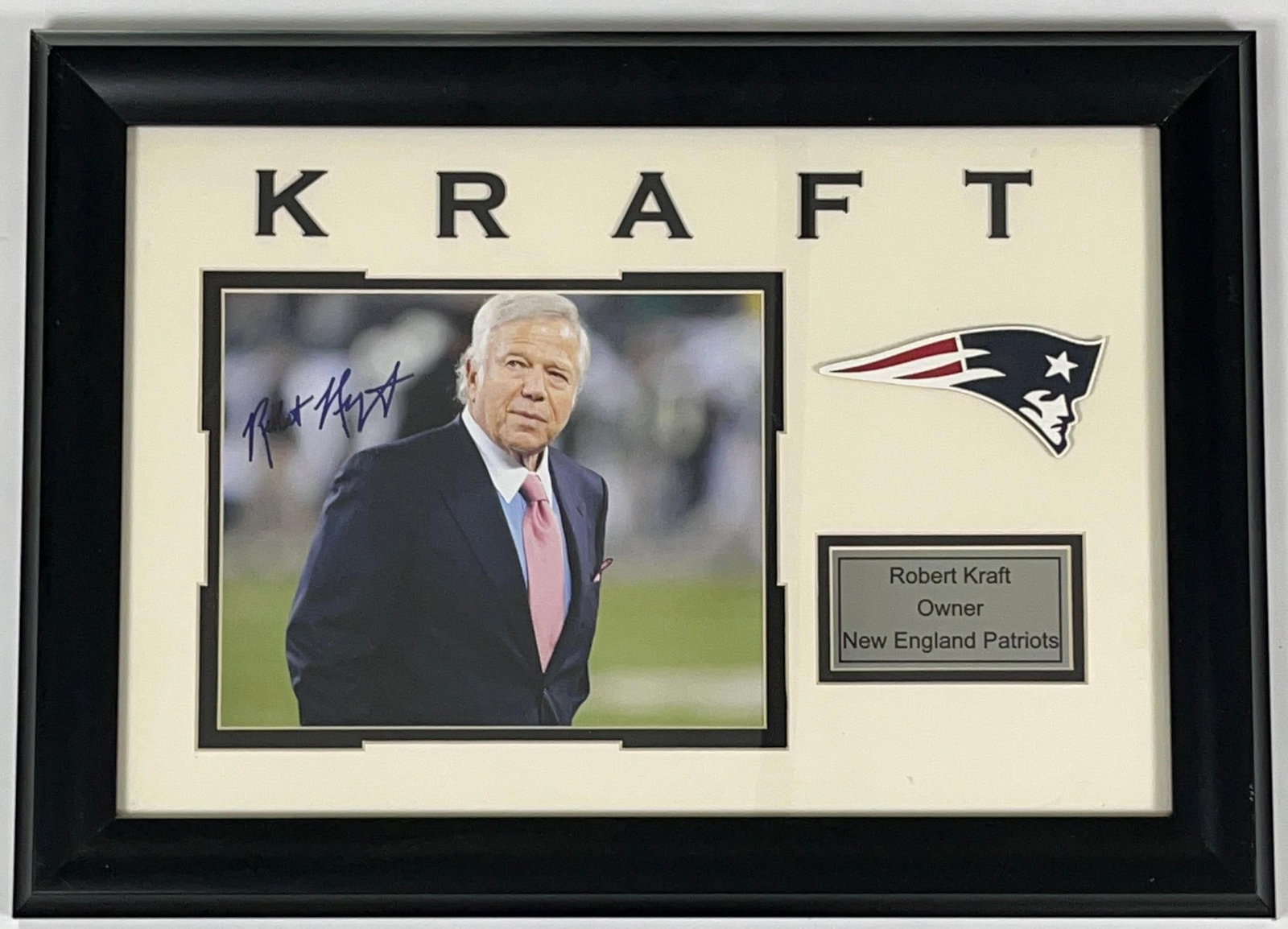 Robert Kraft Signed Framed Photo (Third Party Guaranteed): Color 15.5" x 21.5" framed photo signed in blue felt tip marker by New England Patriots owner Robert Kraft. Signed photo measuring 7.5" x 9.25" is displayed in a frame measuring 15.5" x 21.5"