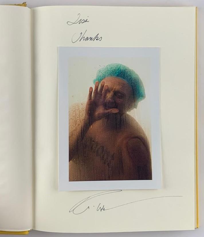 Robin Williams Signed "Old Dogs" Book (Third Party Guaranteed): Hard cover "Old Dogs" book, 11.5" x 9" and 117 pages, signed on the inside front page by comedian and actor Robin Williams, above an original color photograph inserted onto the first page. In very