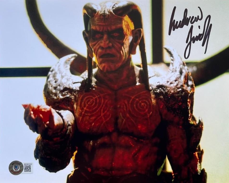 Wishmaster: Andrew Divoff Signed 8" x 10" Photo as Dijin (Beckett): Color 8" x 10" photo of the character Dijin from the film "Wishmaster" signed in black felt tip marker by actor Andrew Divoff. In fine condition. Authenticated by Beckett/BAS, with their official holo
