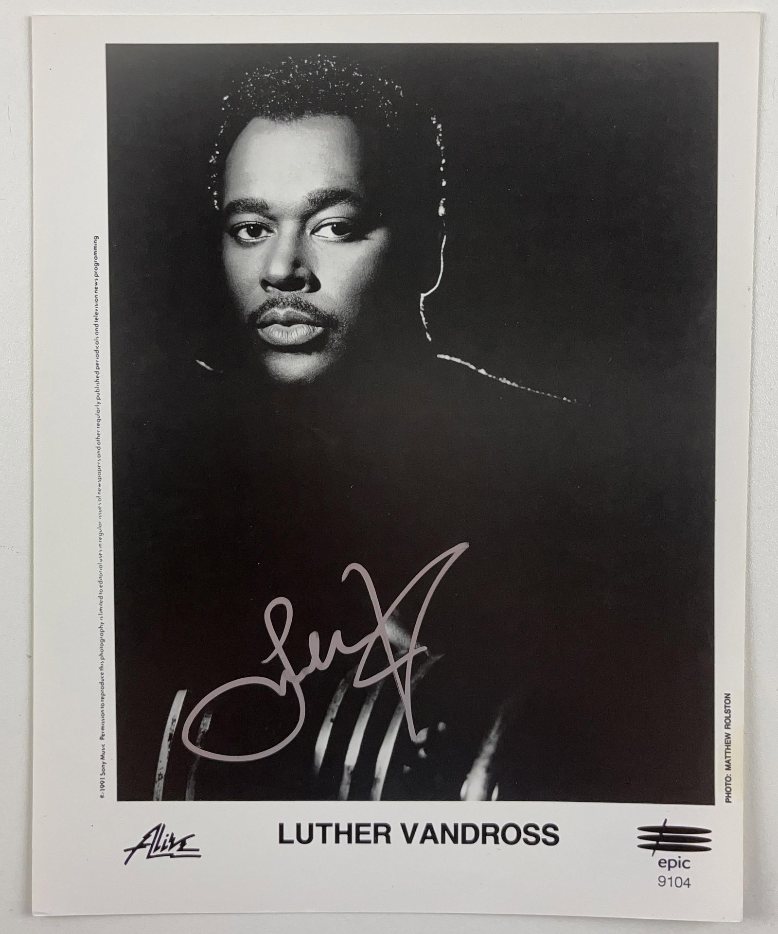 Luther Vandross Signed 10" x 8" Promo Photo (Beckett Authentication): Black-and-white 10" x 8" promotional photo signed in silver felt tip marker by musician Luther Vandross. In fine condition. Accompanied by a full Letter of Authenticity from Beckett (#AD62655).