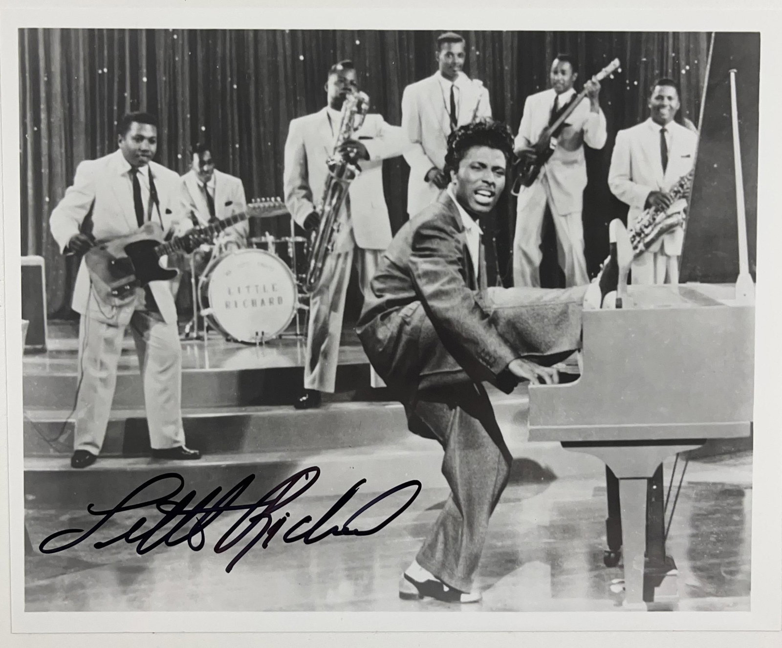 Little Richard Signed 8" x 10" Photo (JSA Authentication): Black-and-white 8" x 10" photo signed in black felt tip marker by musician Little Richard. In fine condition. Accompanied by a full Letter of Authenticity from JSA (#BB72403). Obtained in-person.
