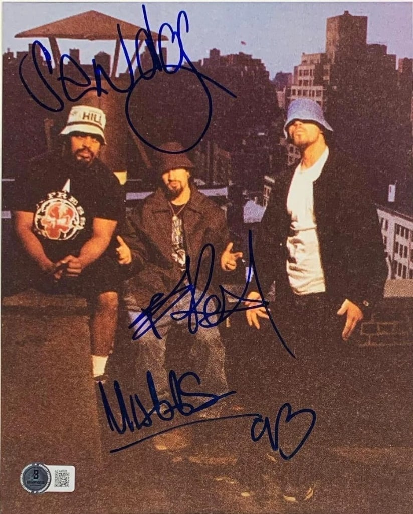 Cypress Hill Signed 10" x 8" Photo (3 Sigs) (Beckett Authentication): Color 10" x 8" photo signed in blue felt tip marker by Cypress Hill band members B-Real, Sen Dog, and DJ Muggs. In fine condition. Accompanied by a full Letter of Authenticity from Beckett