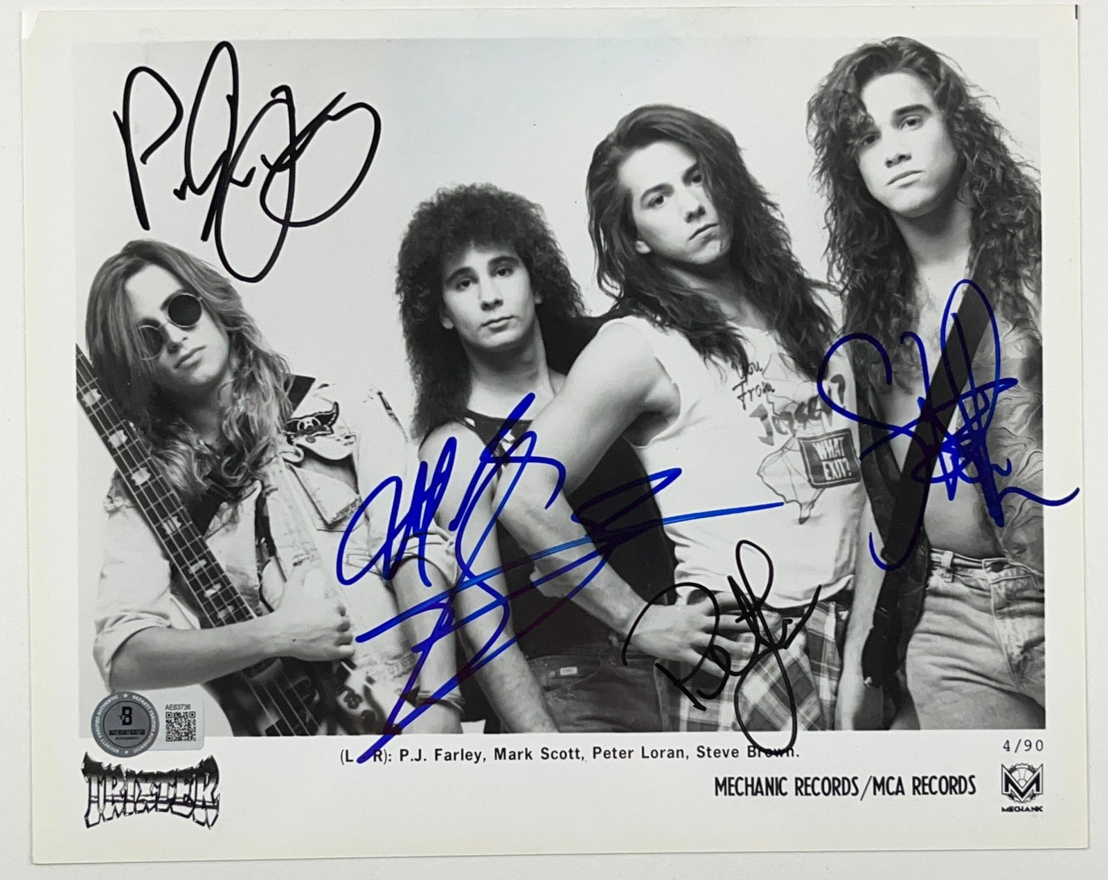 Trixter Group Signed 8" x 10" Promo Photo (4 Sigs) (Beckett Authentication): Black-and-white 8" x 10" promotional photo signed in black and blue felt tip markers by Trixter band members P.J. Farley, Mark Scott, Peter Loran, and Steve Brown. In fine condition. Accompanied by a 