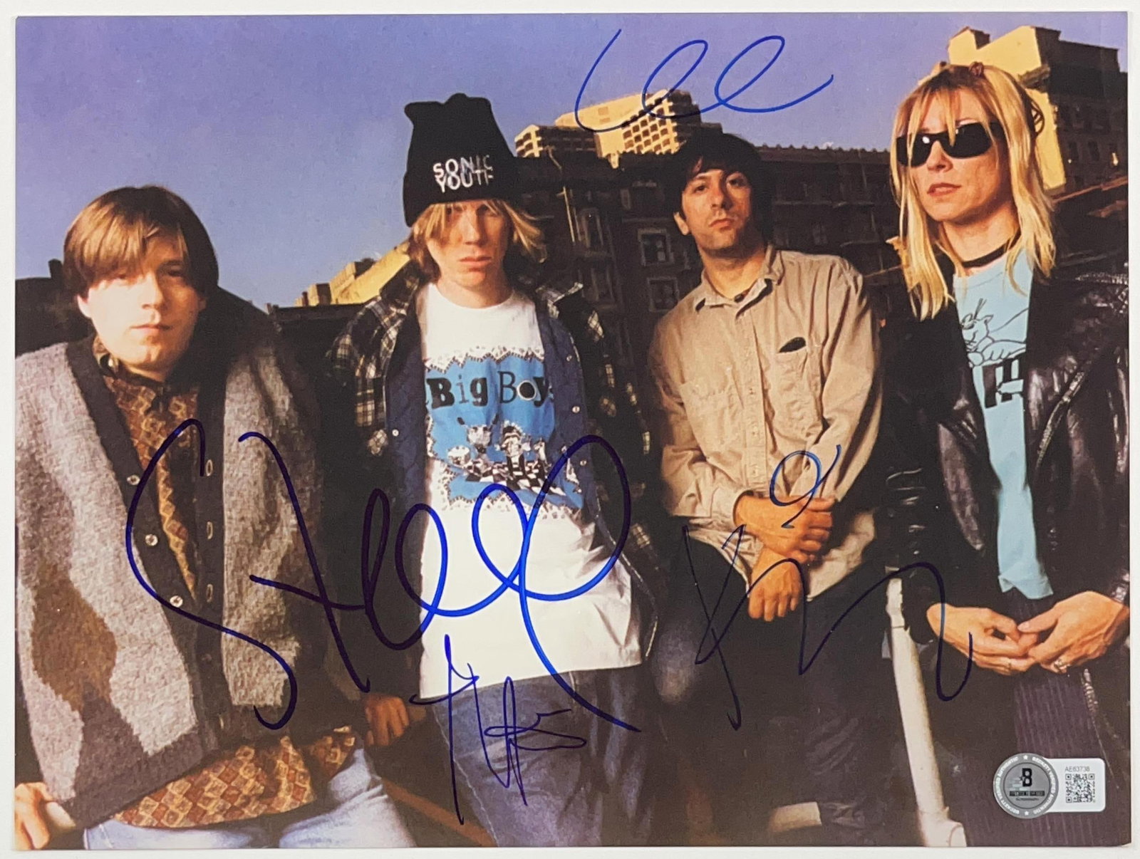 Sonic Youth Group Signed 8" x 10" Photo (4 Sigs) (Beckett Authentication): Color 8" x 10" photo signed in blue felt tip marker by Sonic Youth band members Steve Shelley, Kim Gordon, Lee Ranaldo, and Thurston Moore. In fine condition. Accompanied by a full Letter of