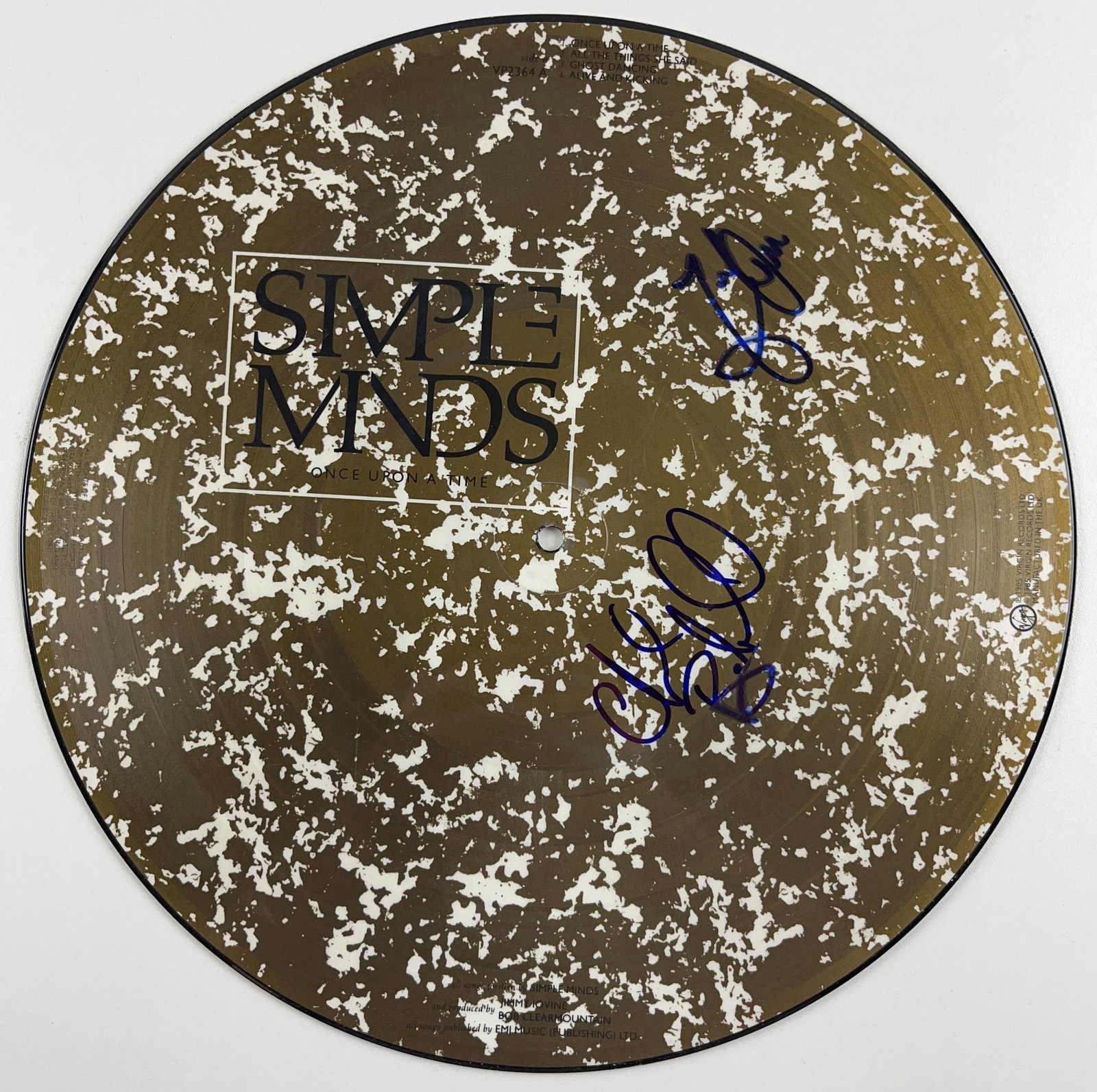 Simple Minds: Jim Kerr & Charlie Burchill Signed "Once Upon a Time" Picture Disc (2 Sigs) (BAS): "Once Upon a Time" album picture disc signed on the cover in blue felt tip marker by Simple Minds band members Charlie Burchill Jim Kerr. Measuring approximately 12" x 12" and in fine condition.