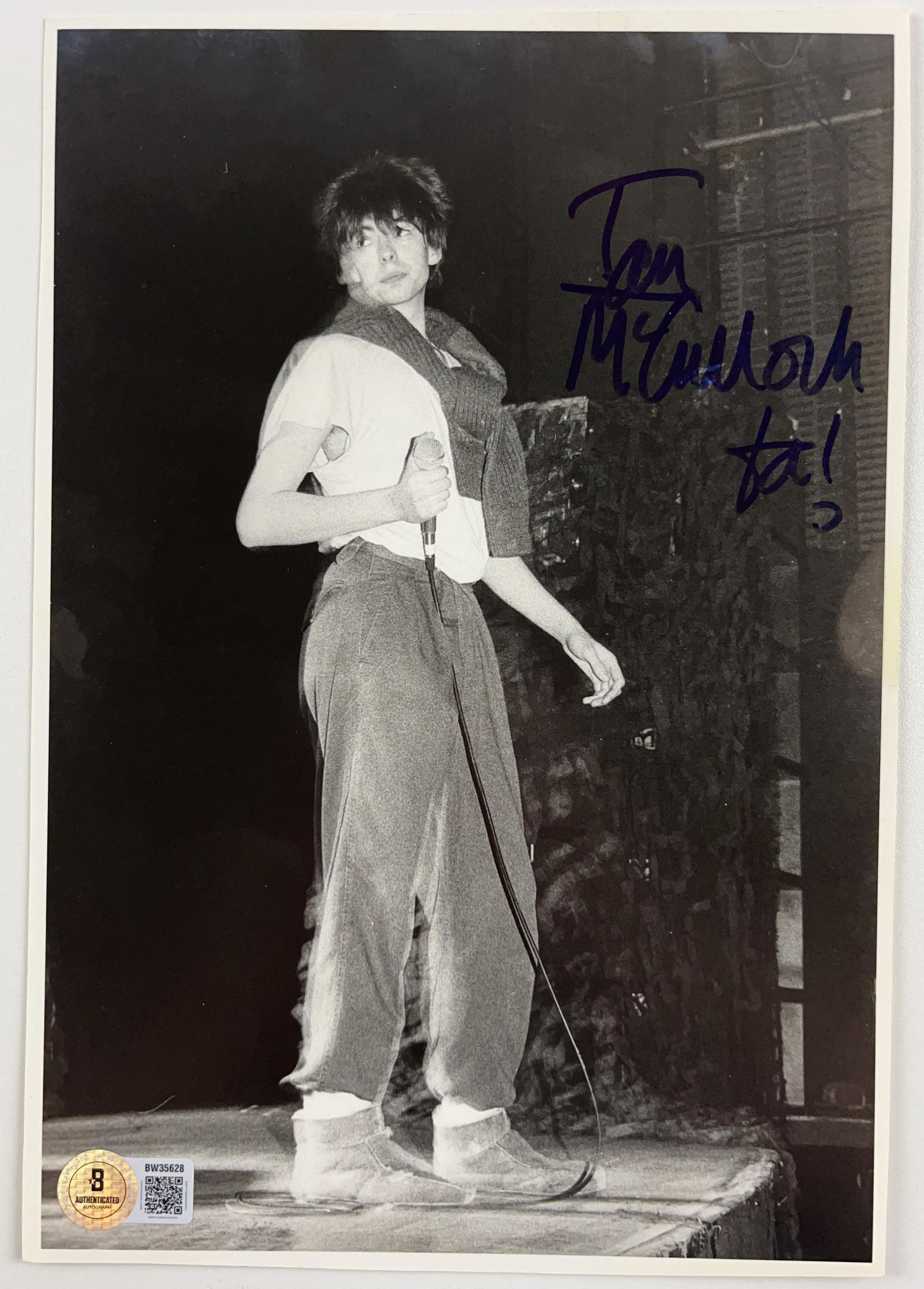 Echo and the Bunnymen: Ian McCulloch Signed 10" x 8" Photo (Beckett Authentication): Black-and-white 10" x 8" photo signed in blue felt tip marker by Echo and the Bunnymen band member Ian McCulloch. In fine condition. Authenticated by Beckett, with their official hologram affixed to