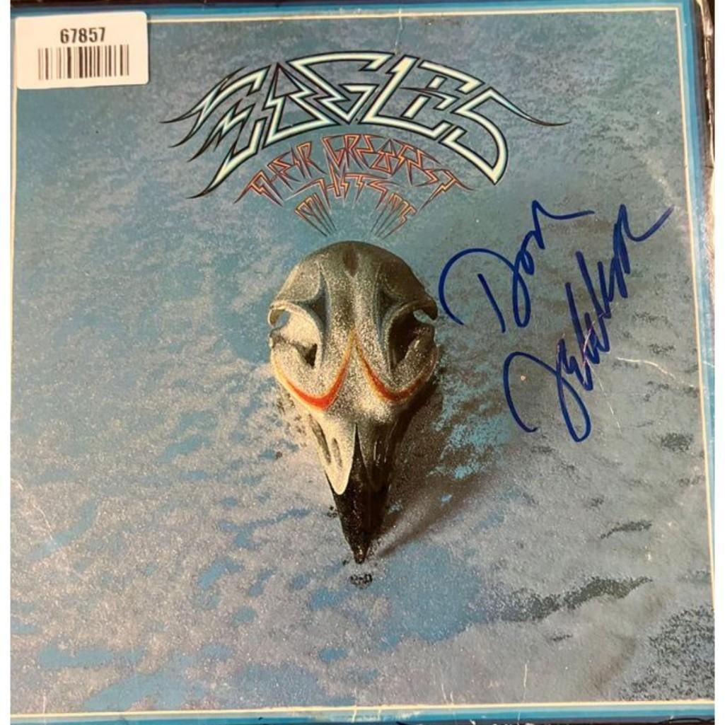 Eagles: Don Felder Signed "Their Greatest Hits 1971-1975" Album (JSA Authentication): "Their Greatest Hits 1971-1975" album signed on the cover in blue felt tip marker by Eagles band member Don Felder. Measuring approximately 12" x 12" and in very good condition, with some signs of