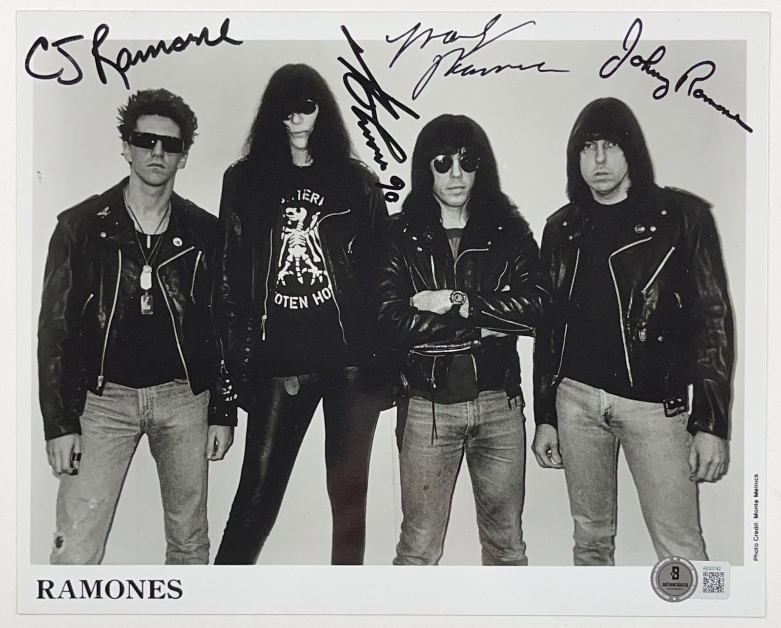Ramones Group Signed 8" x 10" Promo Photo (5 Sigs) (Beckett Authentication): Black-and-white 8" x 10" promotional photo signed in black felt tip marker by The Ramones band members CJ Ramone, Johnny Ramone, Marky Ramone, and Joey Ramone, who inscribed the date "90" after his si
