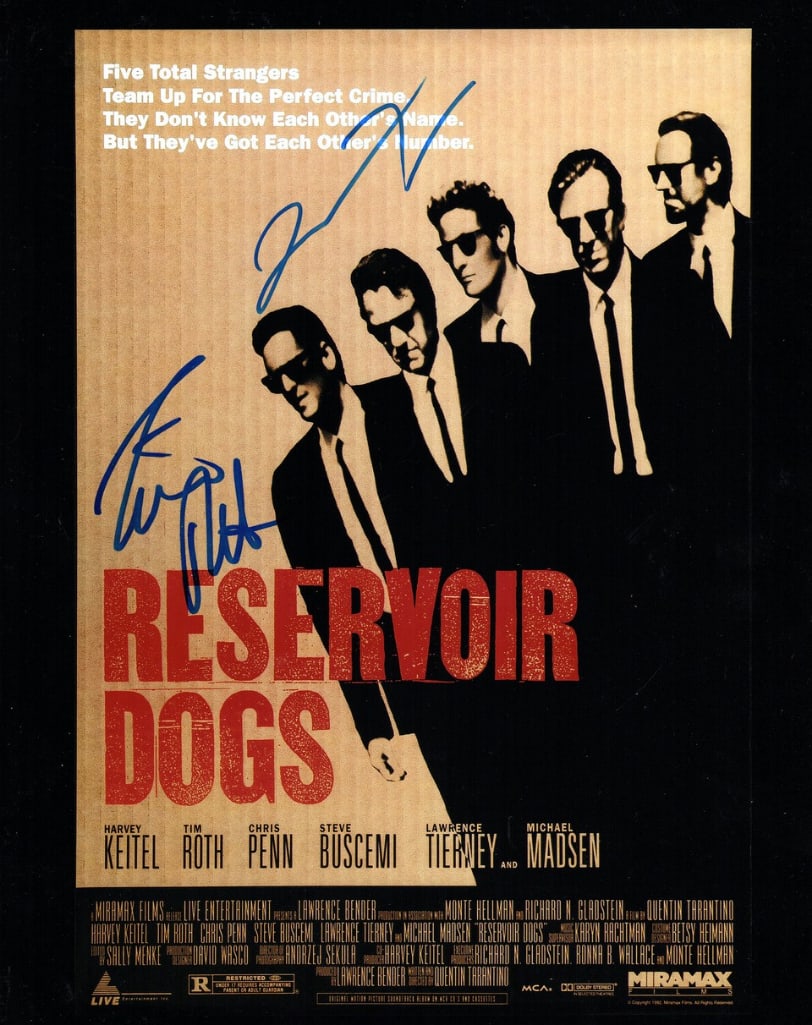 Reservoir Dogs: Quentin Tarantino Signed 14" x 11" Photo (ACOA Authentication): Color 14" x 11" photo from the film "Reservoir Dogs" signed in blue felt tip marker by actor and director Quentin Tarantino. In fine condition. Accompanied by an ACOA COA (#SB79561). Obtained