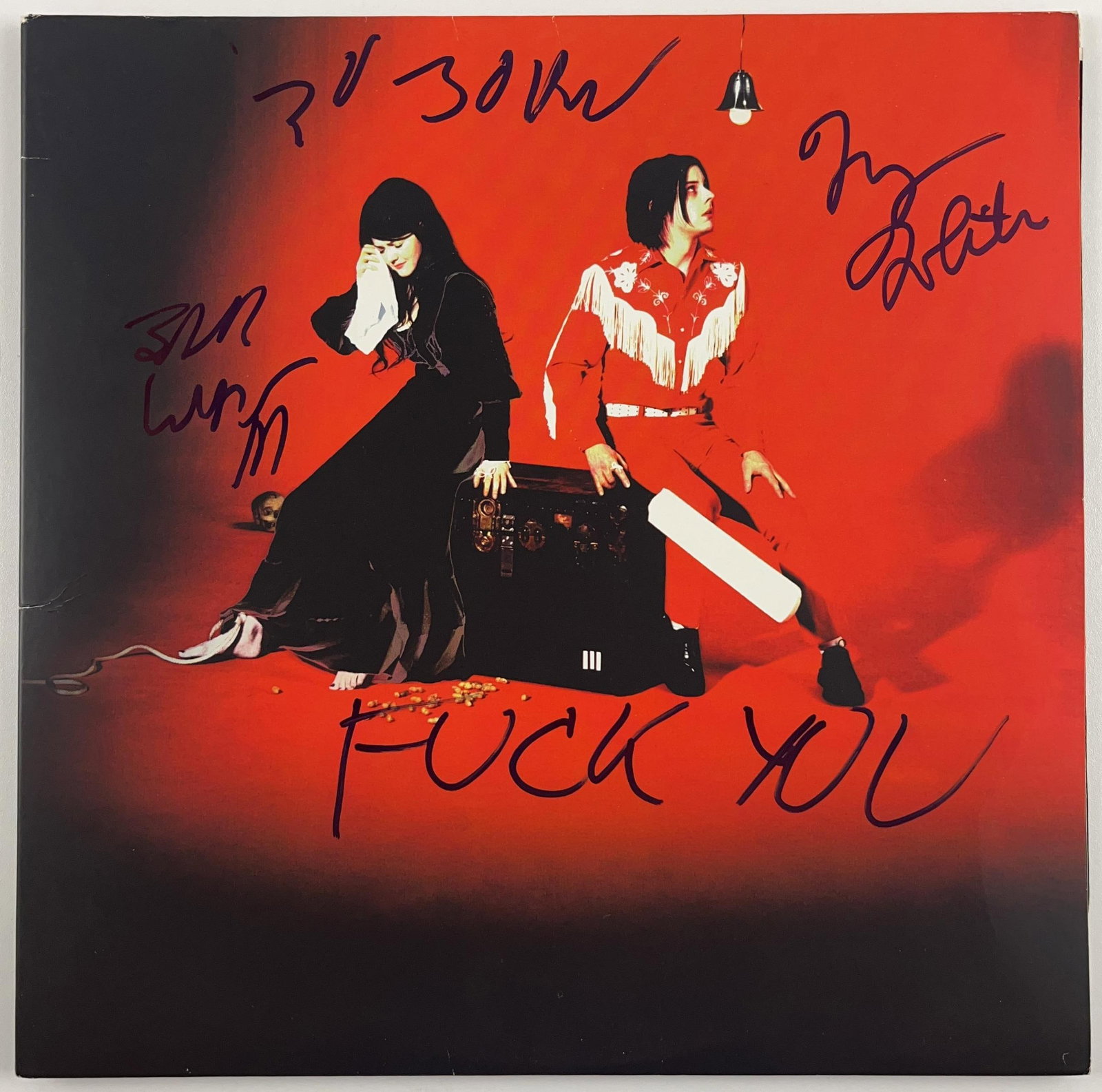 White Stripes Group Signed Meg & Jack White "Elephant" Album (2 Sigs) (Beckett): Rare "Elephant" album signed on the cover in black felt tip marker by White Stripes band members Meg and Jack White, the latter of whom inscribed the message "To John F*** You." Measuring