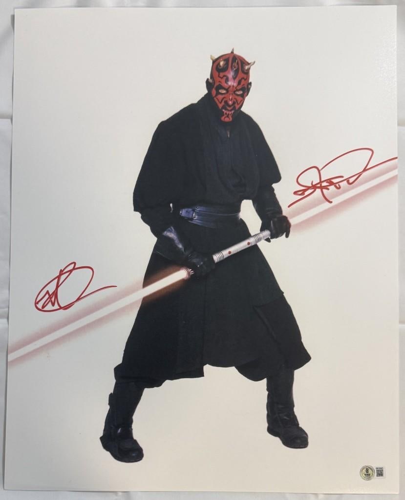 Star Wars: Ray Park Signed 16" x 20" Photo as Darth Maul (Beckett Authentication): Color 16" x 20" photo of character Darth Maul from the "Star Wars" film franchise signed in red felt tip marker by actor Ray Park. In fine condition. Authenticated by Beckett, with their official