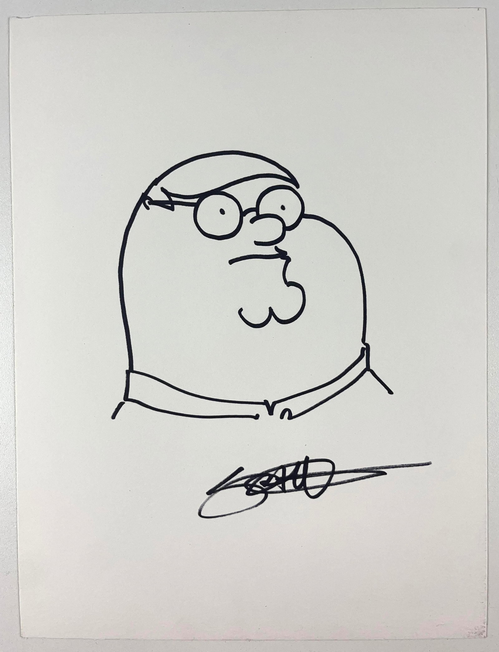 Family Guy: Seth McFarlane Signed 12" x 9" Peter Griffin Drawing (Beckett Authentication): White 12" x 9" card stock drawing of the character Peter Griffin from the television show "Family Guy" signed in black felt tip marker by cartoonist Seth McFarlane. In fine condition. Authenticated by