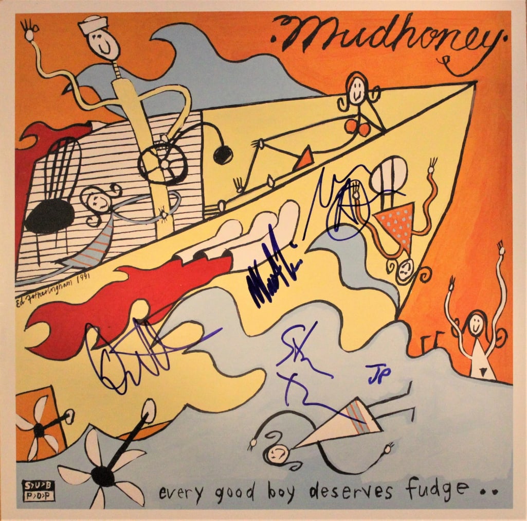 Mudhoney Group Signed "Every Good Boy Deserves Fudge" Album (4 Sigs) (ACOA): "Every Good Boy Deserves Fudge" album signed on the cover in blue felt tip marker by Mudhoney band members Mark Arm, Steve Turner, Guy Maddison, and Dan Peters. Measuring approximately 12" x 12" and i
