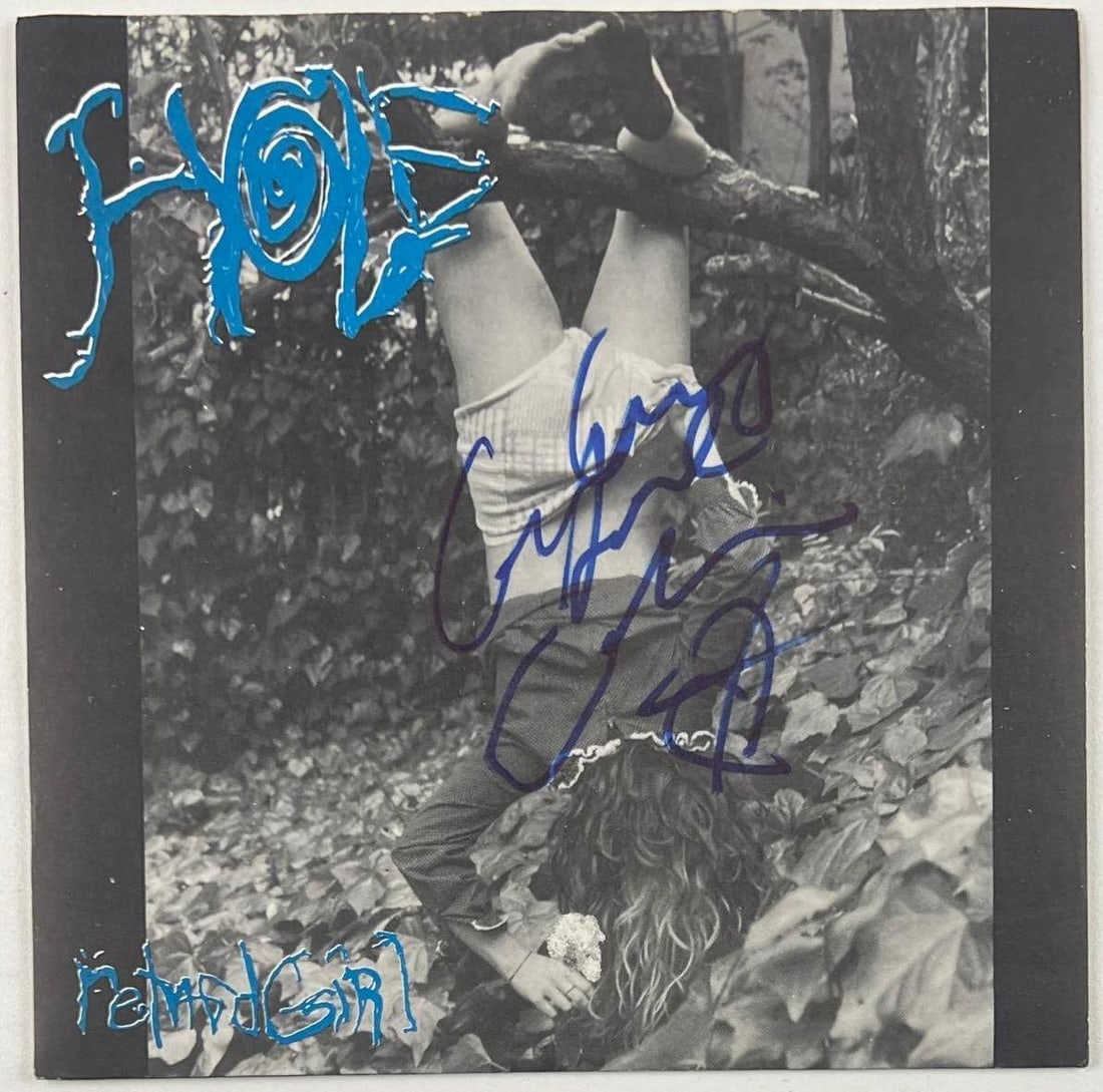 Hole: Courtney Love Signed "Retard Girl" 45 (Beckett Authentication): "Retard Girl" 45 signed on the cover in blue felt tip marker by Hole front woman Courtney Love. Measuring approximately 7" x 7" and in fine condition. Record is included. Obtained in-person.