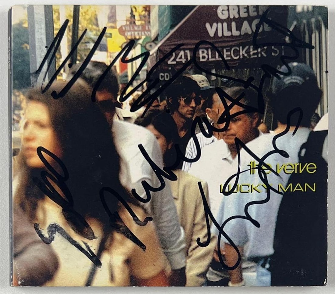 The Verve Fully Group Signed "Lucky Man" CD (5 Sigs) (JSA Authentication): "Lucky Man" CD signed on the cover in black felt tip marker by The Verve band members Richard Ashcroft, Nick McCabe, Peter Salisbury, Simon Tong, and Simon Jones. Measuring approximately 5" x 5" with 