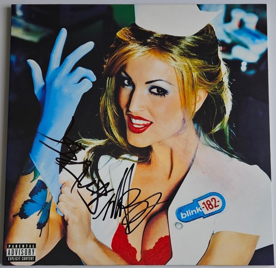 Blink-182: Mark Hoppus & Travis Barker Signed "Enema of the State" Album (2 Sigs): "Enema of the State" album signed on the cover in black felt tip marker by Blink-182 band members Mark Hoppus and Travis Barker. Measuring approximately 12" x 12" and in fine condition. Record is