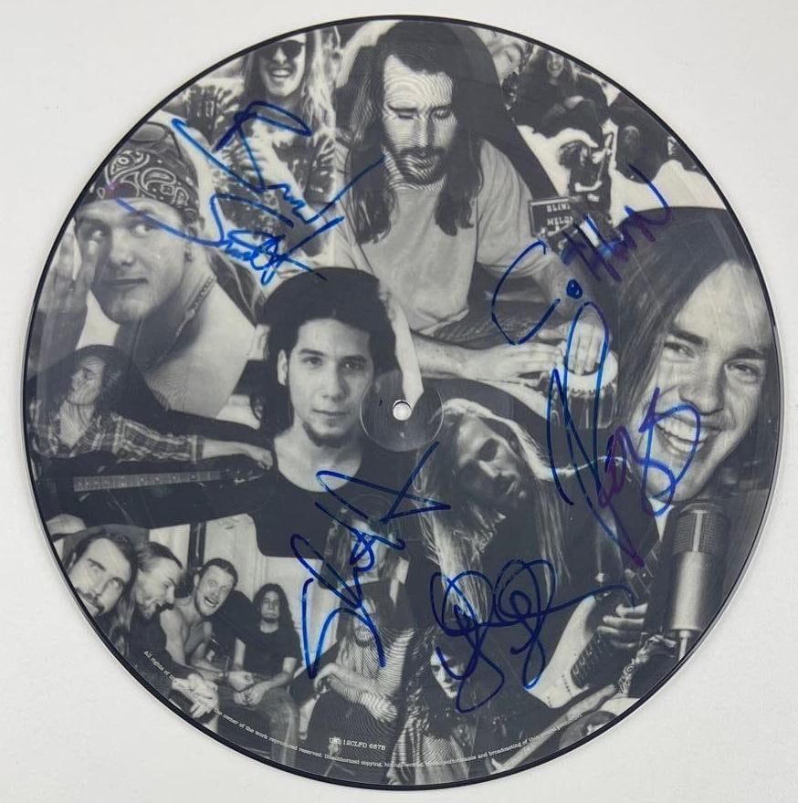 Blind Melon Group Signed Self-Titled Debut Picture Disc (5 Sigs) (Beckett/BAS): Scarce “Blind Melon” self-titled debut album picture disc signed by all five members of Blind Melon, including Shannon Hoon. Authenticated by Beckett/BAS. A highly desirable fully signed