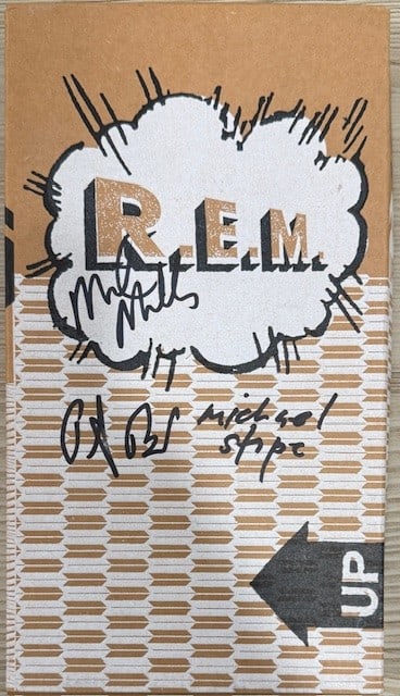 R.E.M. Group Signed "Up" CD Notepad Box (3 Sigs) (Third Party Guaranteed): "Up" notepad box signed in black felt tip marker by R.E.M. band members Michel Stipe, Peter Buck, and Mike Mills. Measuring approximately 10.5" x 6" x 1" and in fine condition. CD is included. Provena