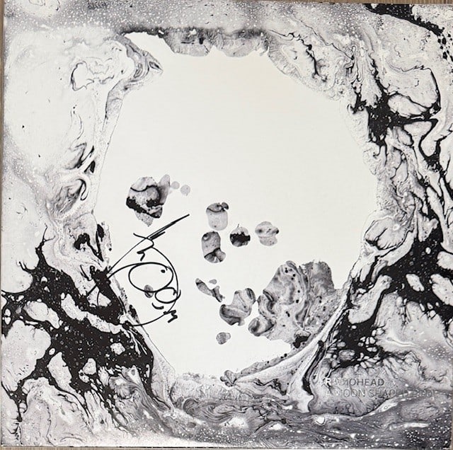 Radiohead: Thom Yorke Signed "A Moon Shaped Pool" LP Album (Third Party Guaranteed): "A Moon Shaped Pool" LP album signed on the cover in black felt tip marker by Radiohead front man Thom Yorke. Measuring approximately 12" x 12" and in fine condition. Record is included. Provenance Ea