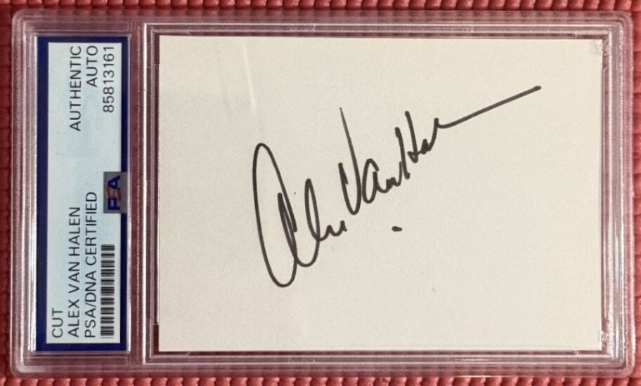 Van Halen: Alex Van Halen Signed 3" x 5" Cut (PSA/DNA Encapsulated): White 3" x 5" cut signed in black felt tip marker by Van Halen band member Alex Van Halen. In fine condition. Encapsulated and authenticated by PSA/DNA (#85813161).