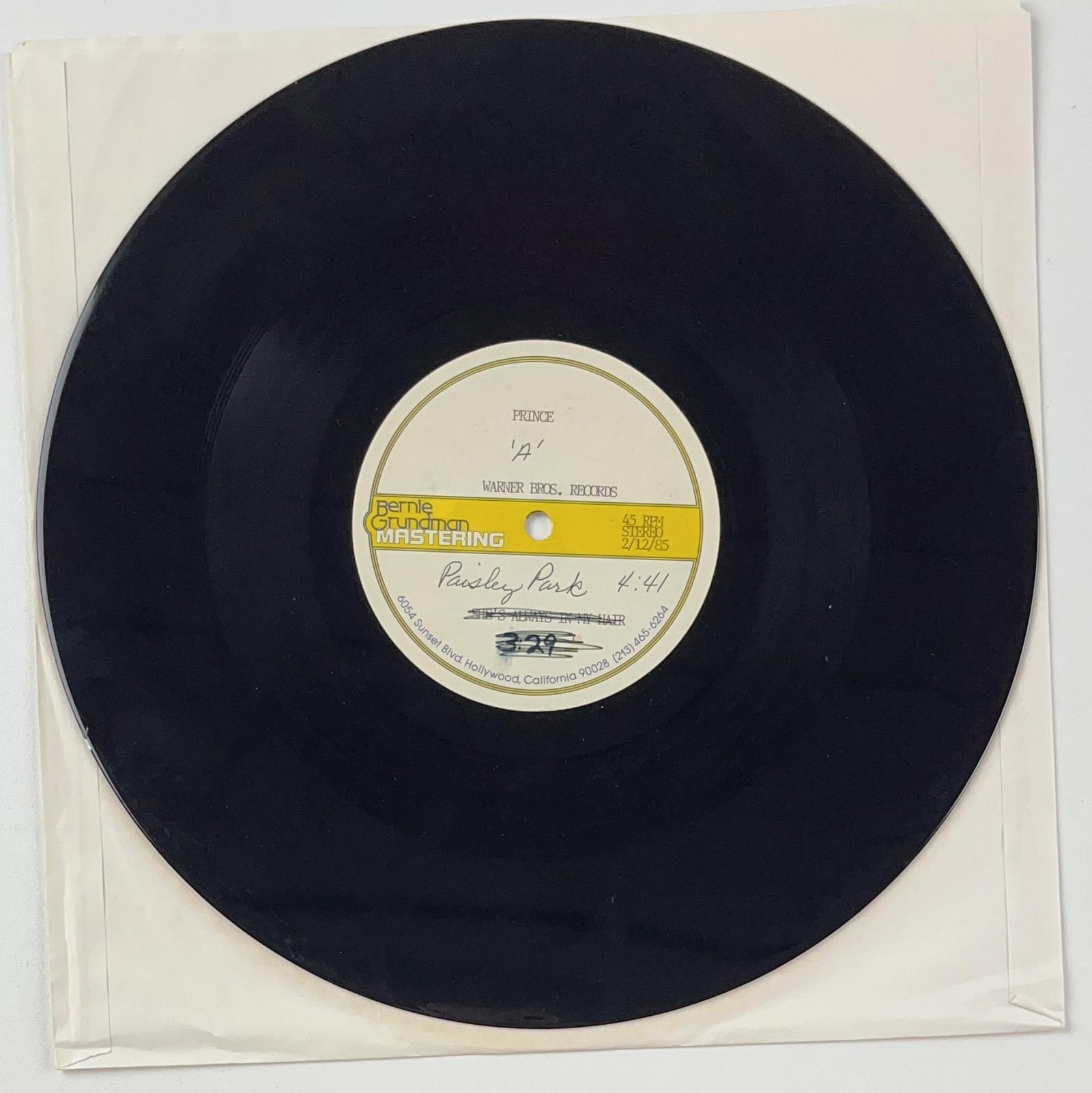 Prince "Paisley Park" & "She's Always in My Hair" Original 1985 Acetate: Rare Warner Bros. Records Prince “Paisley Park” and “She’s Always in My Hair” double-sided acetate disc. Side A label reads “Prince ‘A’ Warner Bros. Rec