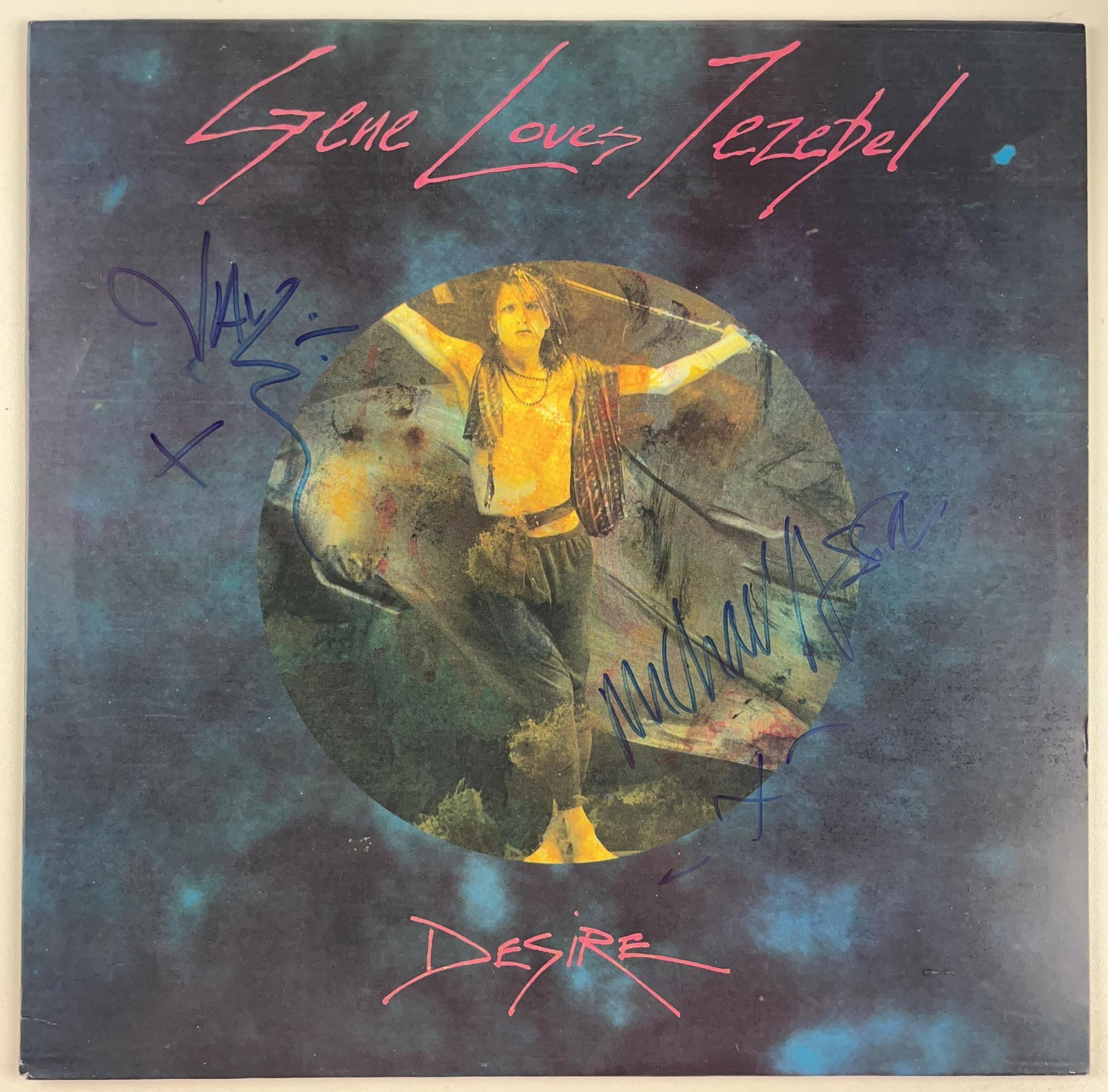 Gene Loves Jezebel: Jay & Michael Aston Signed "Desire" Album (2 Sigs) (Beckett Authentication): "Desire" album signed on the cover in blue felt tip marker by Gene Loves Jezebel band members Jay and Michael Aston. Measuring approximately 12" x 12" and in fine condition. Record is included. Obtain
