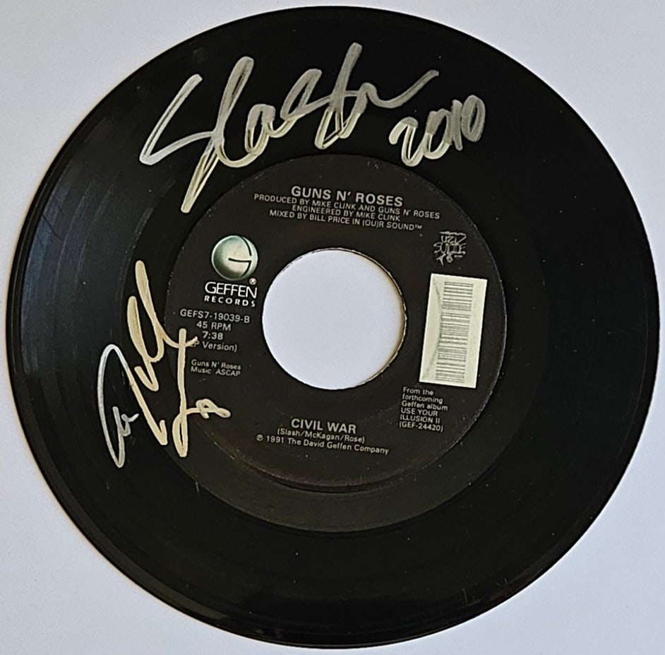 Guns N' Roses: Slash & Steven Adler Signed "Civil War" 45 (2 Sigs) (Third Party Guaranteed): "Civil War" 45 signed on the record disc front in silver felt tip marker by Guns N' Roses band members Slash and Steve Adler. Measuring approximately 7" x 7" and in fine condition. Provenance Eaton & 