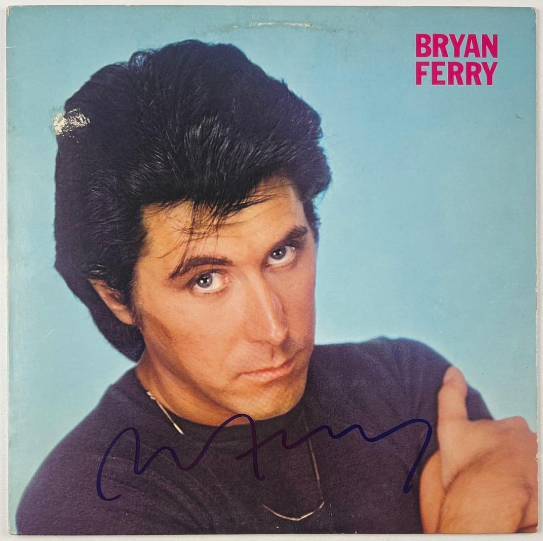 Roxy Music: Bryan Ferry Signed "These Foolish Things" Album (Beckett Authentication): "These Foolish Things" album signed on the cover in blue felt tip marker by Roxy Music front man Bryan Ferry. Measuring approximately 12" x 12" and in very good condition, with some signs of