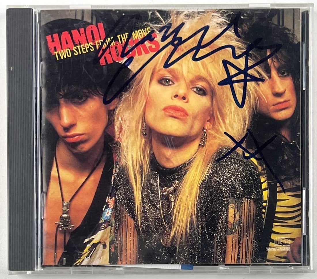Hanoi Rocks: Michael Monroe Signed "Two Steps From the Move" CD (Beckett Authentication): "Two Steps From the Move" CD signed on the cover in black felt tip marker by Hanoi Rocks front man Michael Monroe. Measuring approximately 5" x 5" and in fine condition. CD is included. Obtained in-pe