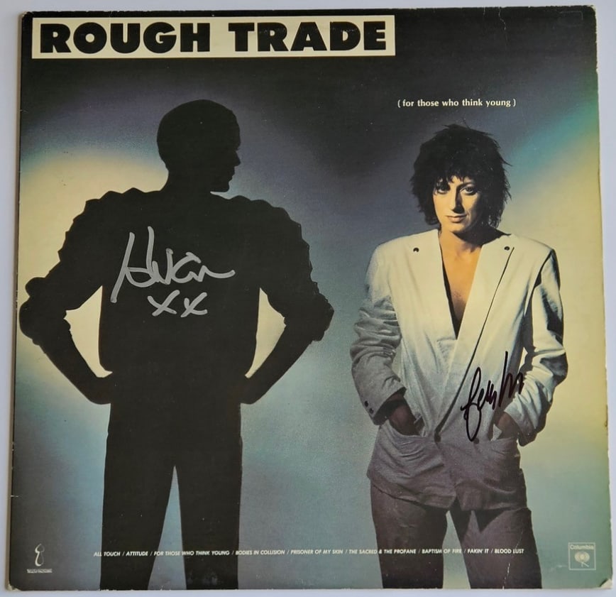 Rough Trade: Carole Pope & Kevan Staples Signed "For Those Who Think Young" Album (2 Sigs): "For Those Who Think Young" album signed on the cover in silver and black felt tip markers by Rough Trade band members Carole Pope and Kevan Staples. Measuring approximately 12" x 12" and in fine