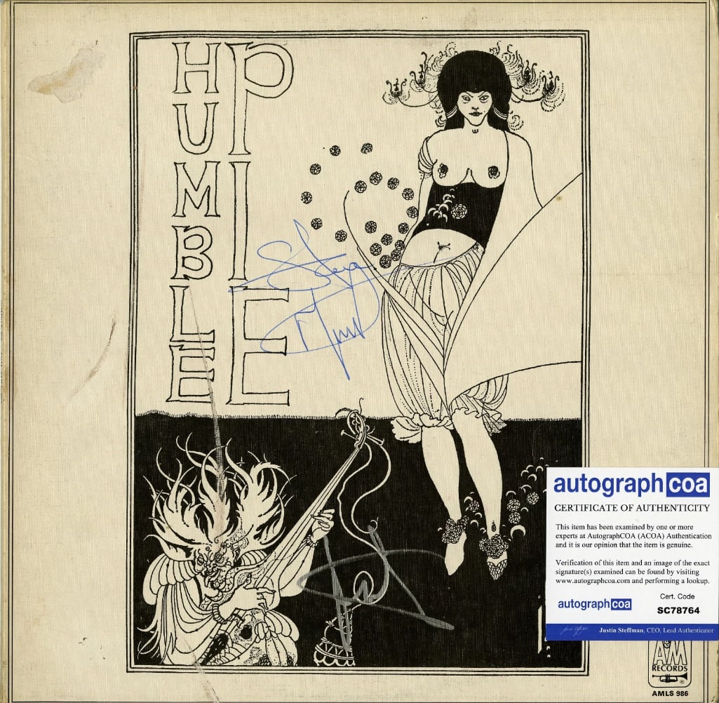 Humble Pie: Steve Marriott & Jerry Shirley Signed Self-Titled Album (2 Sigs) (ACOA): "Humble Pie" album signed on the cover in blue ballpoint pen by Humble Pie band members Steve Marriott and Jerry Shirley. Measuring approximately 12" x 12" and in very good condition, with some signs