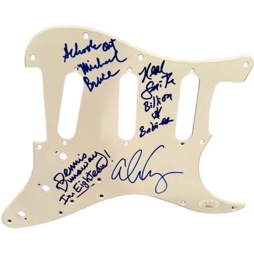 Alice Cooper Band Group Signed Stratocaster-Style Pickguard (4 Sigs) (JSA): White stratocaster-style guitar pickguard signed in blue felt tip marker by Alice Cooper Band band members Alice Cooper, Neal Smith, who inscribed "million $ babies" after his signature, Dennis Dunawa