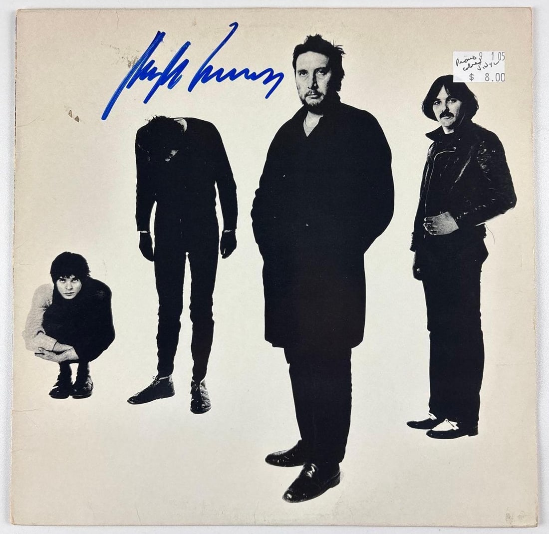 The Stranglers: Hugh Cornwell Signed "Black and White" Album (Beckett Authentication): "Black and White" album signed on the cover in blue felt tip marker by The Stranglers band member Hugh Cornwell. Measuring approximately 12" x 12" and in very good condition, with some signs of scatte