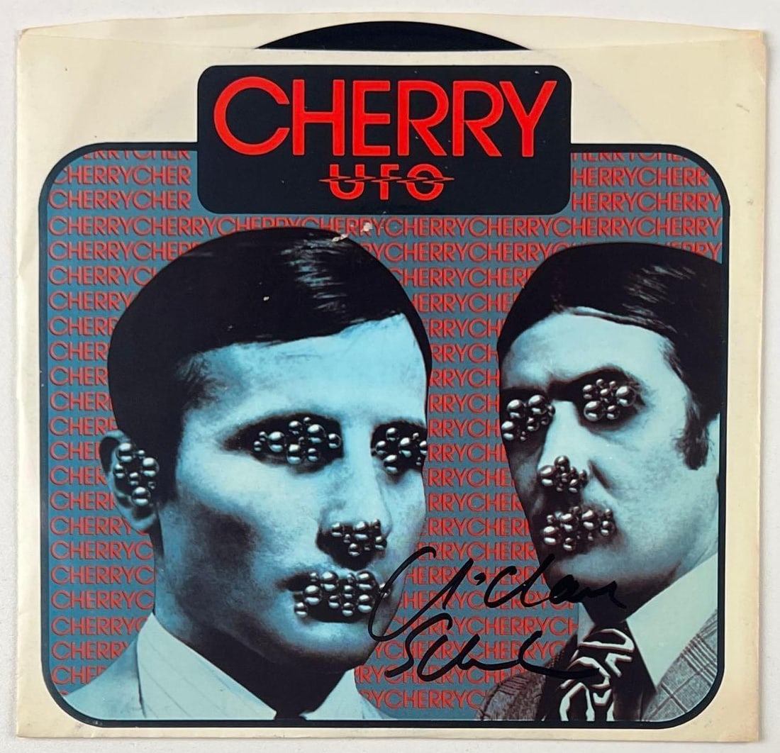 UFO: Michael Schenker Signed "Cherry" 45 (Beckett Authentication): "Cherry" 45 signed on the cover in black felt tip marker by UFO band member Michael Schenker. Measuring approximately 7" x 7" and in fine condition. Record is included. Obtained in-person.