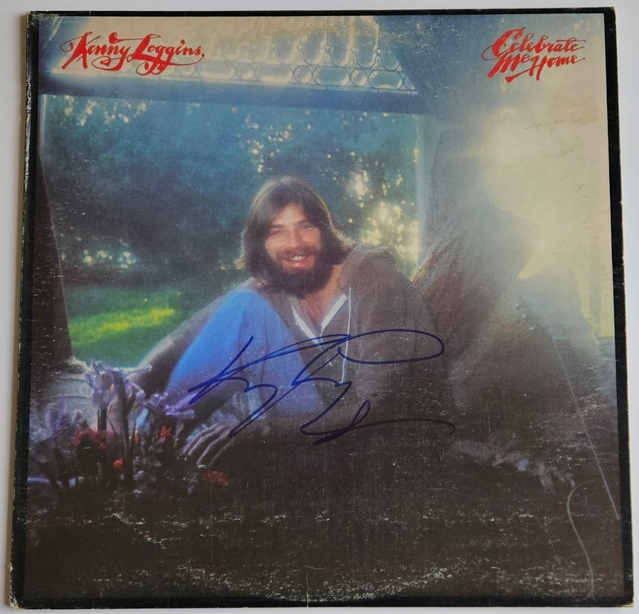 Kenny Loggins Signed "Celebrate Me Home" Album (Third Party Guaranteed): "Celebrate Me Home" album signed on the cover in blue felt tip marker by musician Kenny Loggins. Measuring approximately 12" x 12" and in fine condition. Record is included. Provenance Eaton & Brennan