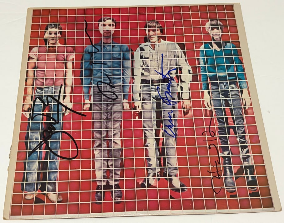 Talking Heads Fully Signed "More Songs About Buildings and Food" Album (4 Sigs) (JSA Authentication): "More Songs About Buildings and Food" album signed on the cover in black and blue felt tip markers by Talking Heads band members David Byrne, Jerry Harrison, Chris Frantz, and Tina Weymouth. Measuring
