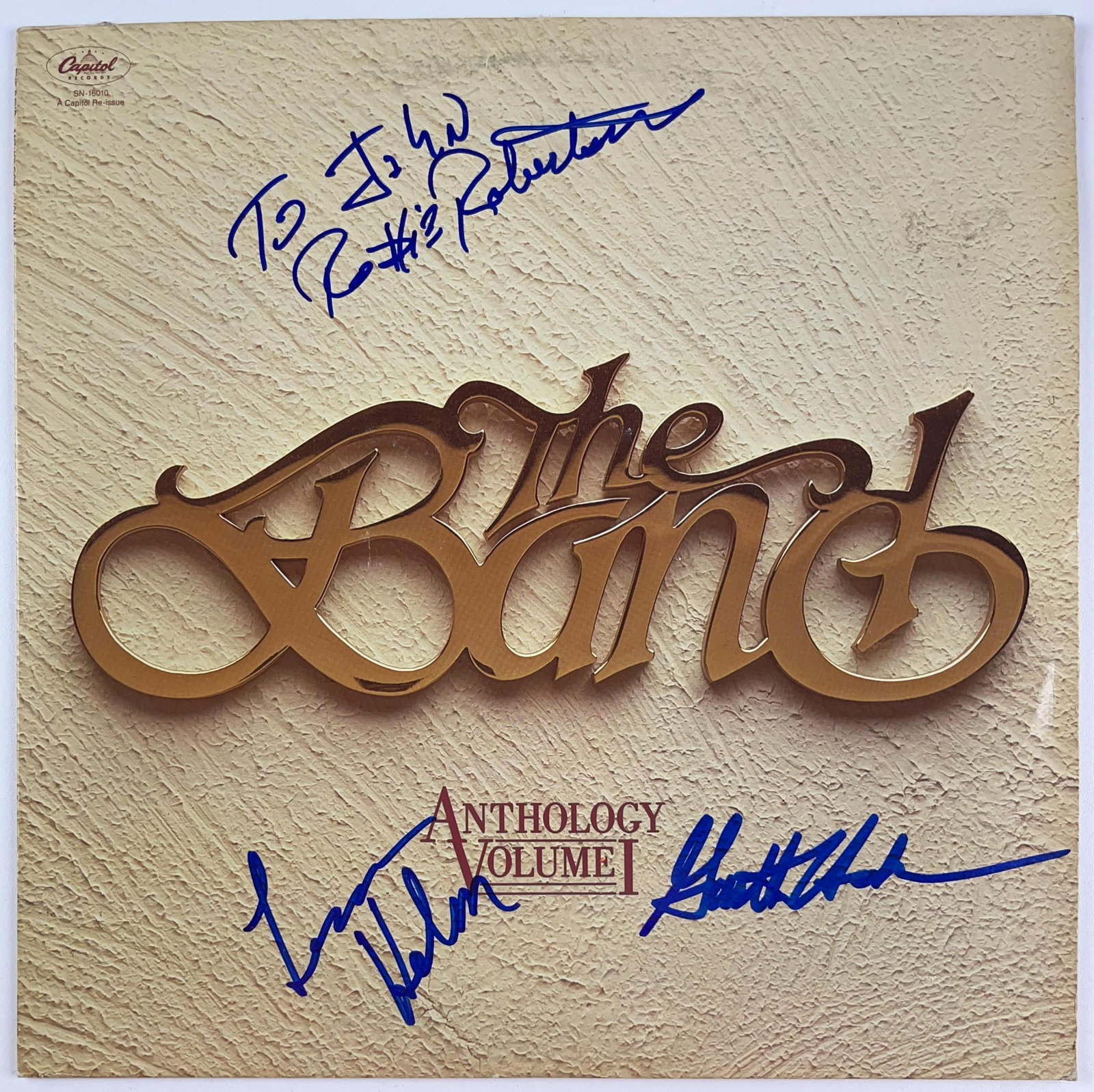 The Band Group Signed "Anthology" Album (3 Sigs) (Beckett Authentication): "Anthology" album signed on the cover in blue felt tip marker by The Band band members Levon Helm, Garth Hudson, and Robbie Robertson, who inscribed "To John" before his signature. Measuring approxima
