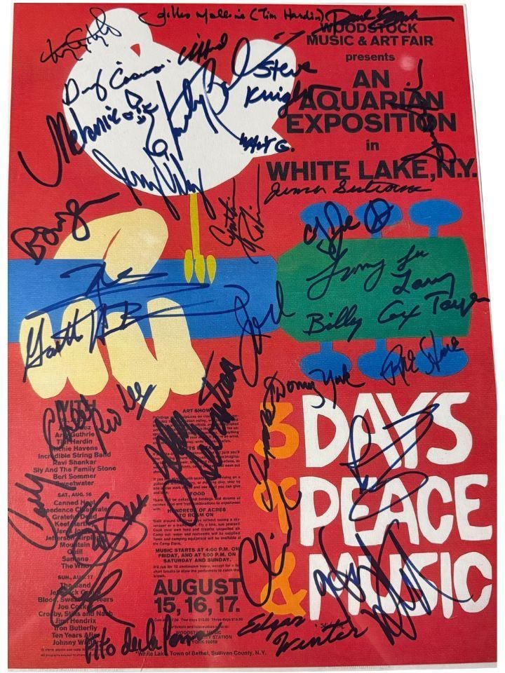 Woodstock 1969 Extensively Signed “3 Days of Peace & Music” Reproduction Poster (20+ Sig: Color 15" x 11" reproduction poster from the 1969 Woodstock Music Festival signed in blue and black felt tip marker by multiple bands and artists, including members of Crosby, Stills, Nash & Young,