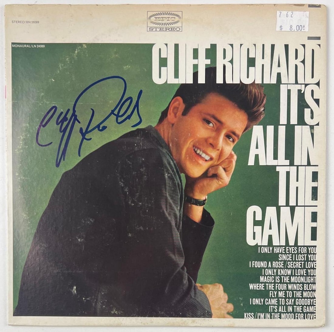 Cliff Richards Signed "It's All in the Game" Album (JSA Authentication): "It's All in the Game" album signed on the cover in blue felt tip marker by musician Cliff Richards. Measuring approximately 12" x 12" and in fine condition. Record is included. Obtained in-person. Ac