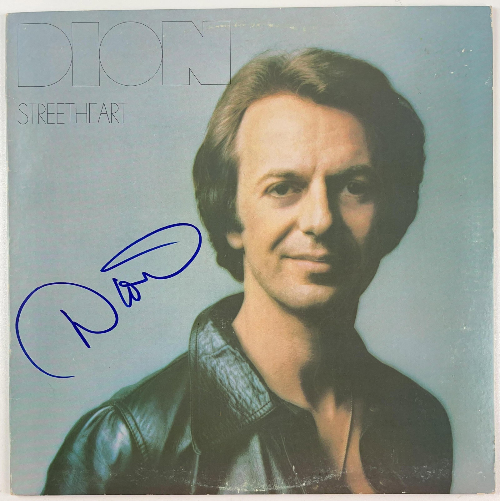 Dion Signed "Streetheart" Album (Beckett Authentication): "Streetheart" album signed on the cover in blue felt tip marker by musician Dion. Measuring approximately 12" x 12" and in very good condition, with some signs of scattered wear. Record is included. O