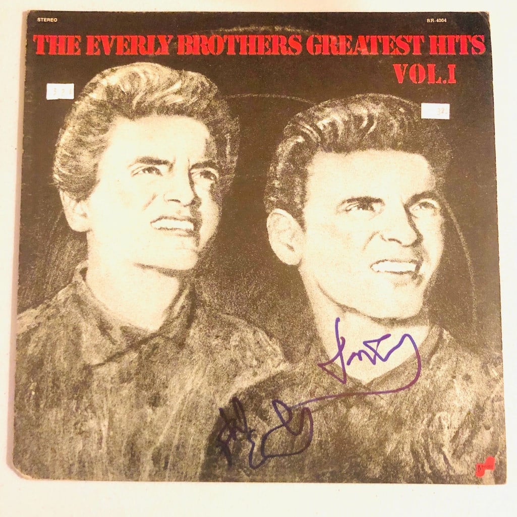 The Everly Brothers Signed "Greatest Hits Vol.1" Album (2 Sigs) (Beckett Authentication): "Greatest Hits Vol.1" album signed on the cover in blue felt tip marker by the Everly Brothers Phil and Don Everly. Measuring approximately 12" x 12" and in fine condition. Record is included.