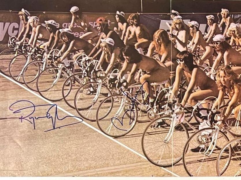 Queen: Brian May & Roger Taylor Signed "Fat Bottomed Girls" Album Poster (2 Sigs) (BAS): Scarce "Fat Bottomed Girls” fold-out poster signed in blue felt tip marker by Queen members Brian May and Roger Taylor at the bottom left hand corner. Measuring approximately 12" x 35" open and