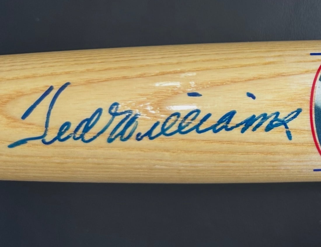 Ted Williams Signed Boston Red Sox Outfielder "Famous Player Series" Baseball Bat: Cooperstown brand Boston Red Sox outfielder Ted Williams "Famous Player Series" baseball bat, signed by Williams, with the bat boasting career statistics and player profile printed onto the barrel.